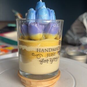 Handmade Floral Candle with Blue and Yellow Accents